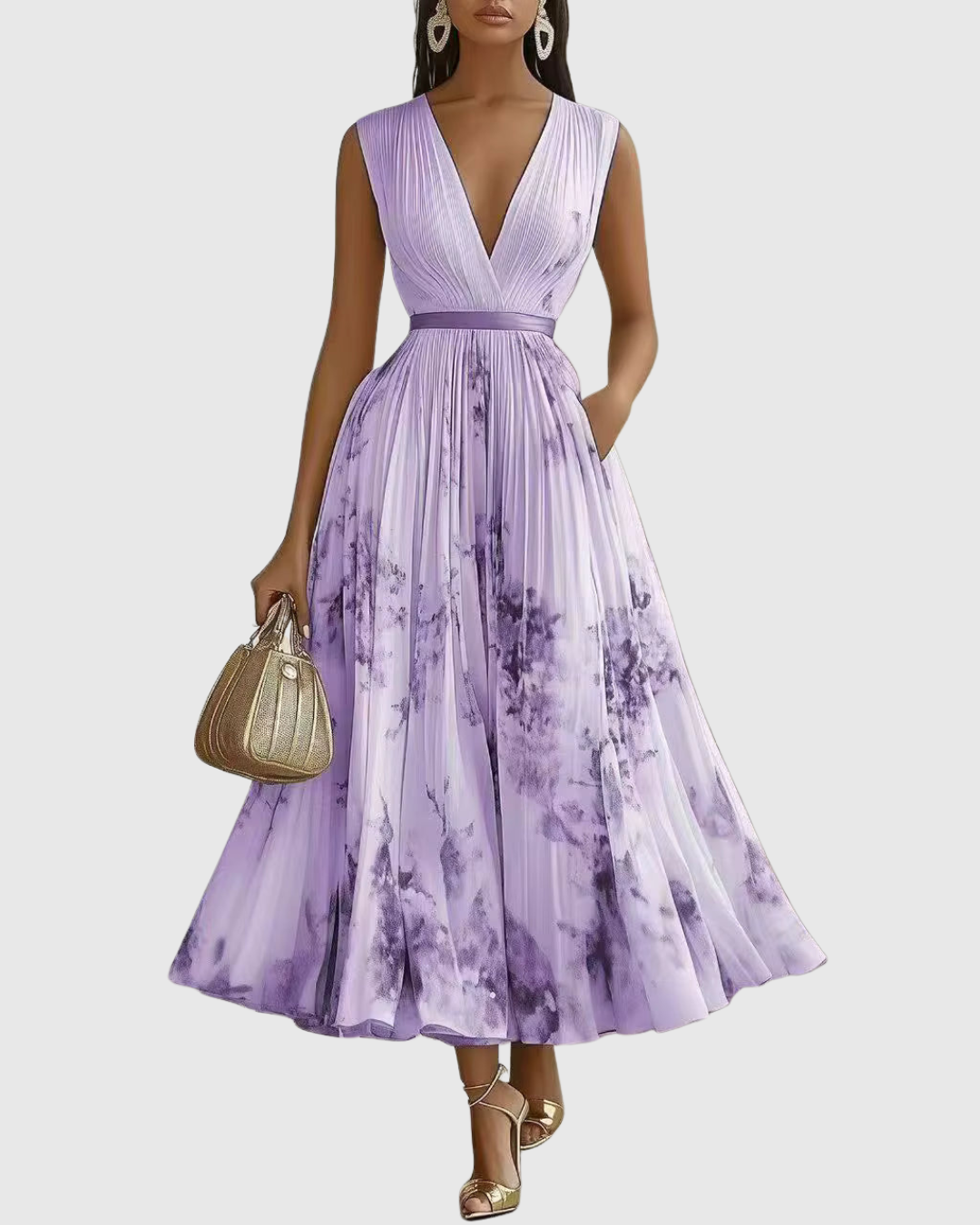 Robe longue plissée élégante de Danoir Paris, modèle Rowella, en vert, portée sur mannequin, style sophistiqué et fluide.