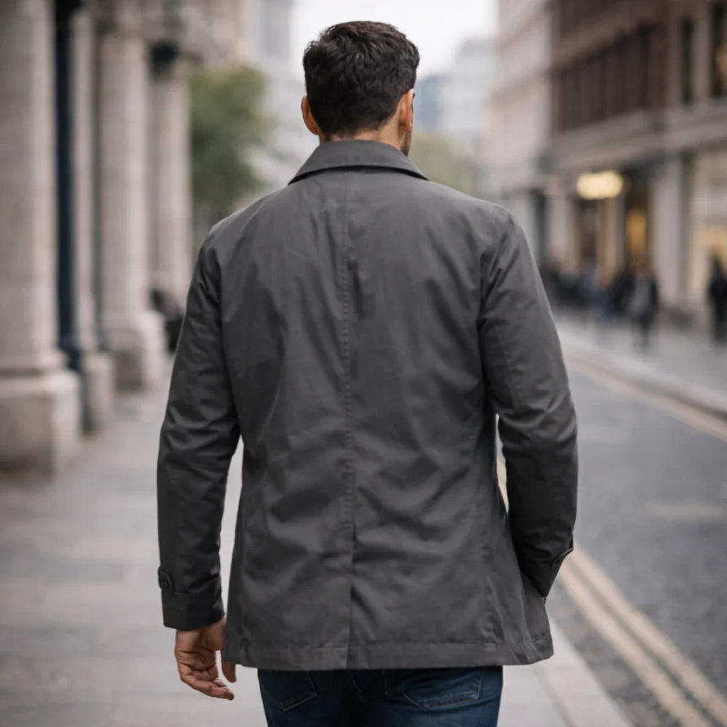 Manteau mi-saison Danoir Paris Vittorio en gris, élégant, léger, avec col classique et coupe ajustée.