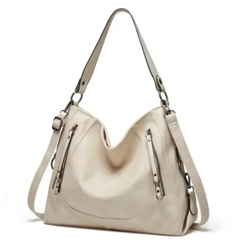 Sac Nora élégant quotidien Danoir Paris en gris, avec poignées et compartiments spacieux, idéal pour un style chic et pratique.