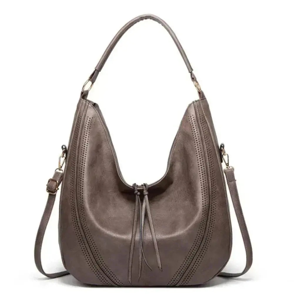 Sac vintage Danoir Paris Anya en gris, sac à main intemporel et polyvalent avec design élégant et classique.