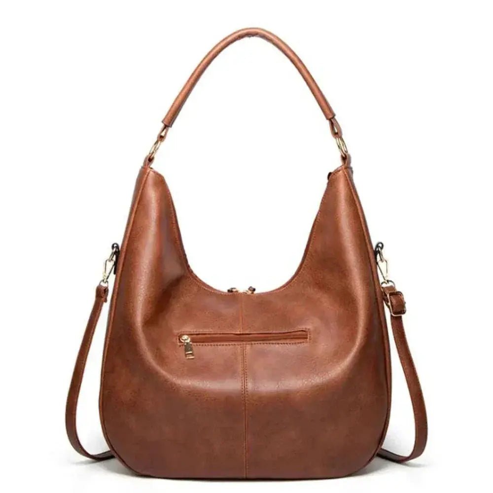 Sac vintage Danoir Paris Anya en gris, élégant et polyvalent, avec poignée en cuir et compartiments spacieux.