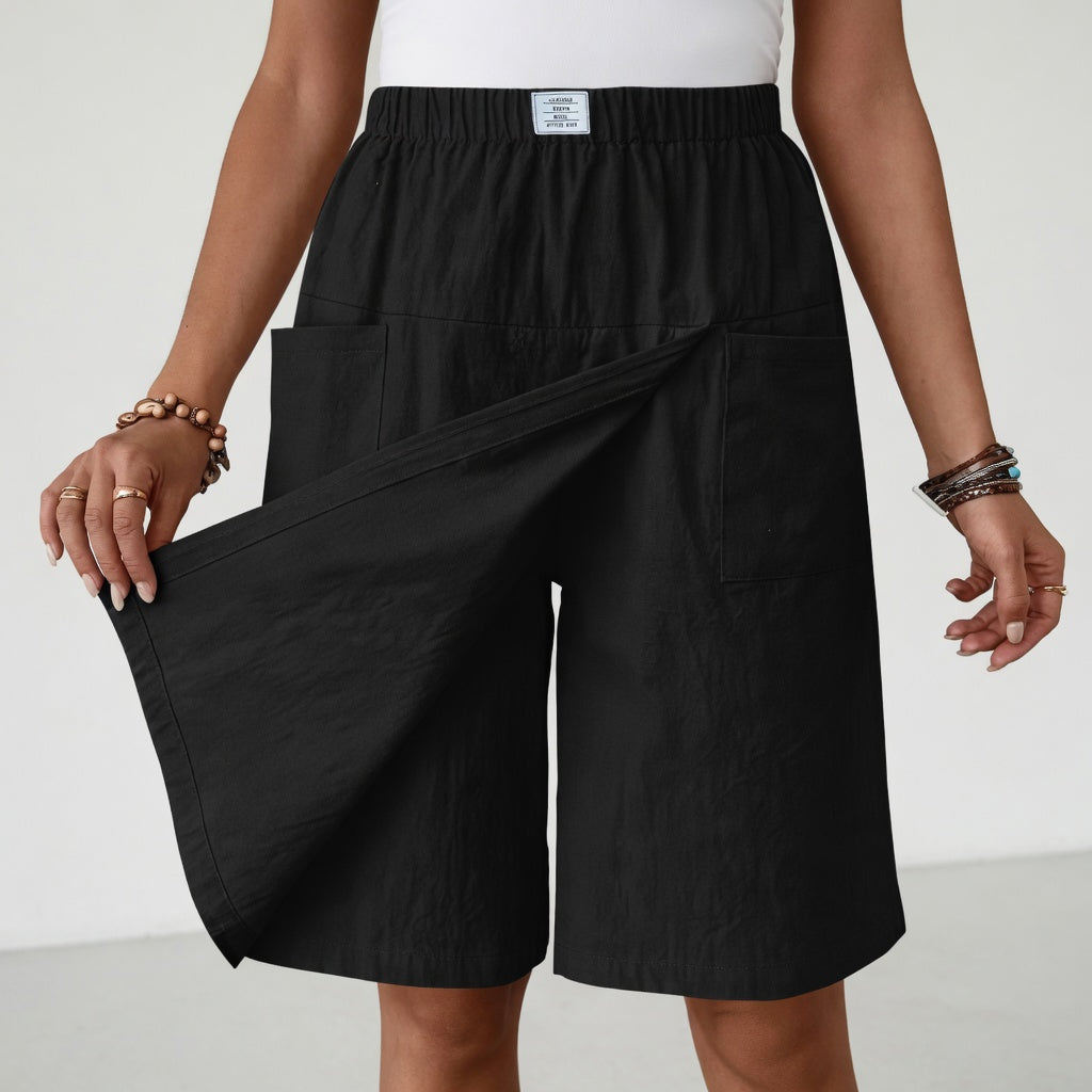 Short en gris clair Libertine™ de Danoir Paris avec taille élastique, poches et design sport pour liberté d'activité.