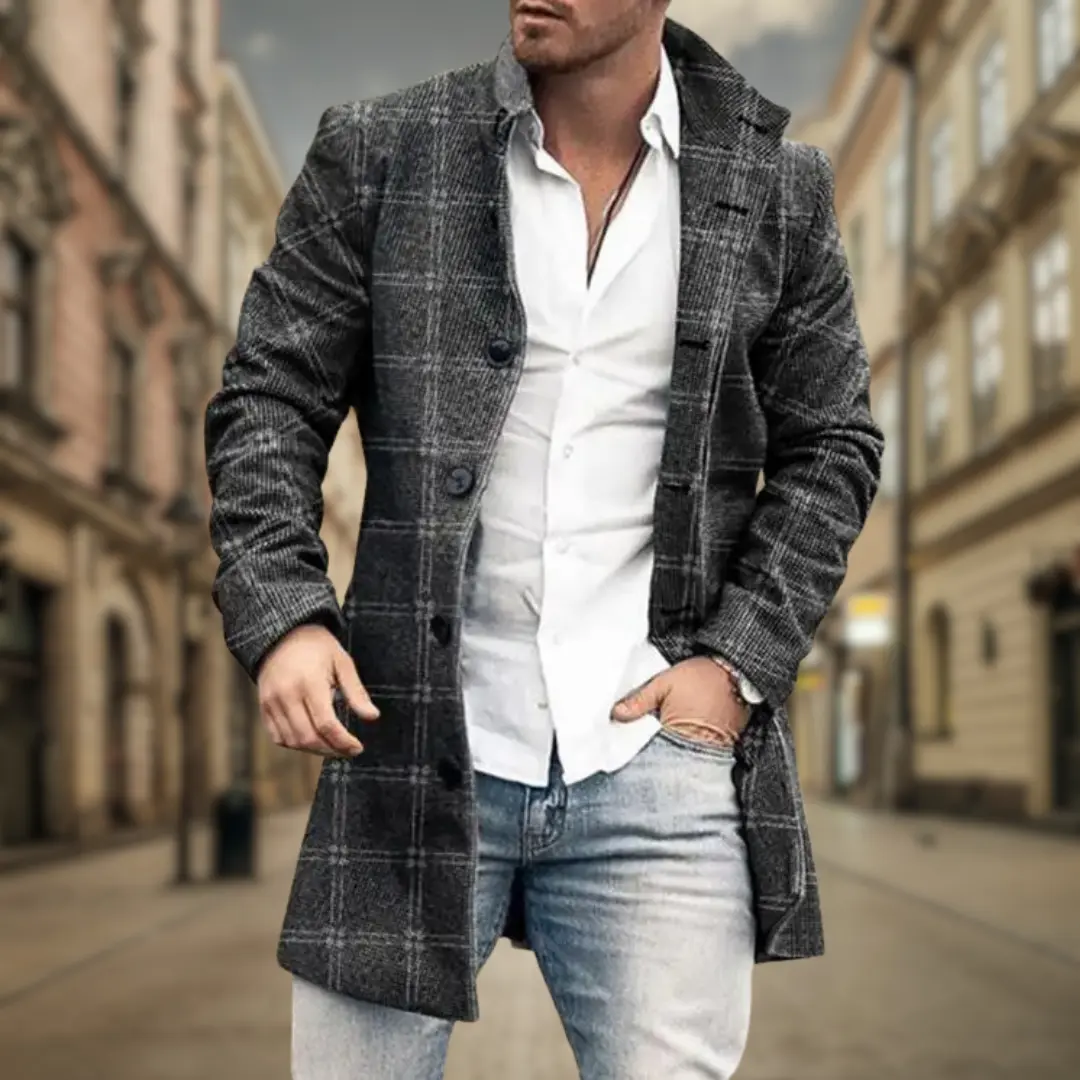 Manteau élégant pour homme Danoir Paris en gris classique, vu de face, avec col et boutons visibles.