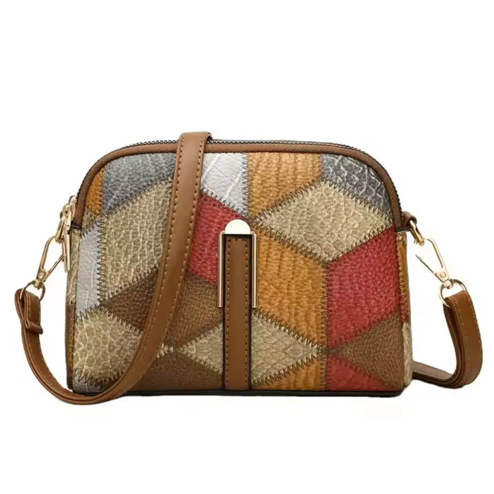 Mini sac bandoulière Danoir Paris Clio en patchwork gris, avec poignées et détails colorés, pour un look tendance et pratique.
