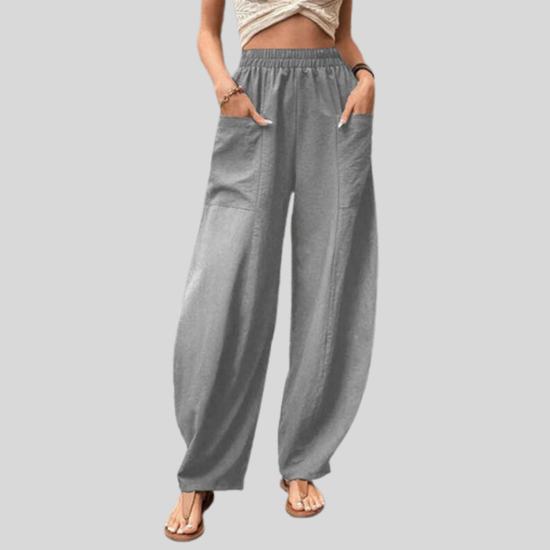 Pantalons fluides Vanna Danoir Paris en tissu gris léger, élégant et confortable pour femmes.