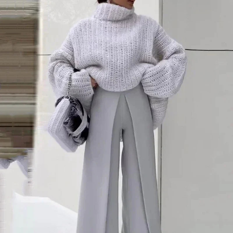 Veste gris Danoir Paris Flavie, élégante pour l'automne/hiver, avec détails sophistiqués et coupe confortable.