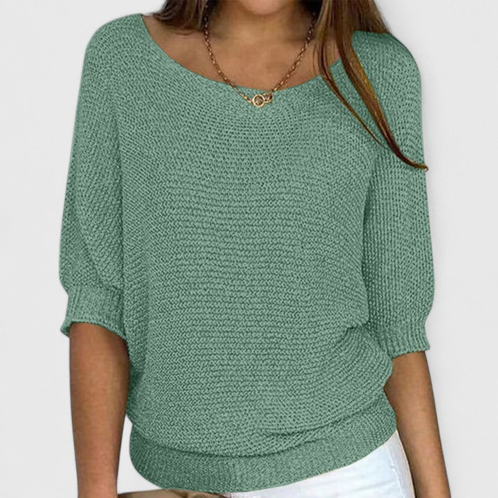 Pull en maille gris Rachel de Danoir Paris, sans effort, doux et confortable, porté sur un mannequin.