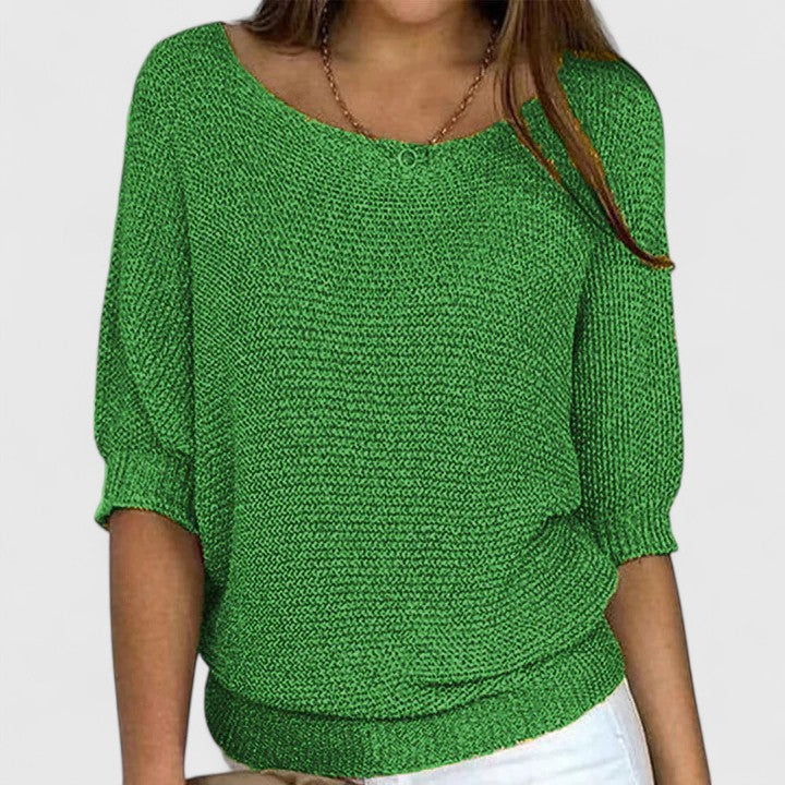 Pull en maille gris Rachel de Danoir Paris, doux et sans effort, porté en style décontracté sur un mannequin.