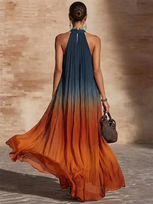 Robe longue halter Danoir Paris Paula avec dégradé, vêtement élégant en tissu fluide, porté avec style.