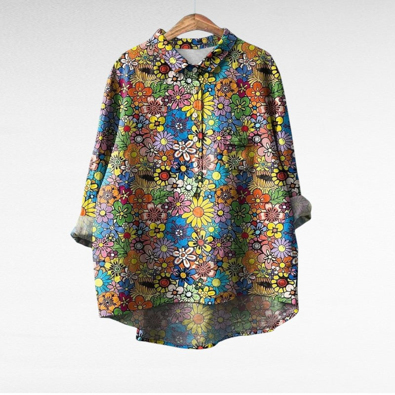 Blouse fleurie rétro Marjolaine de Danoir Paris avec imprimé floral, manches longues et style élégant.
