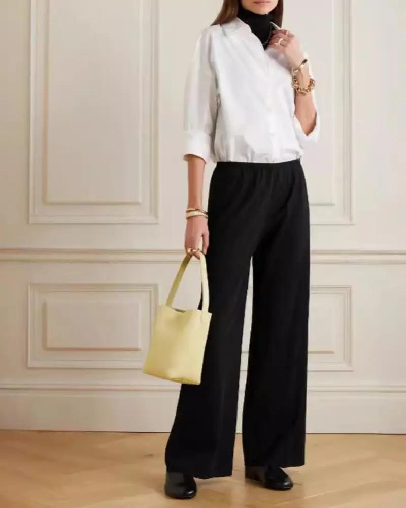 Pantalon Palais Danoir Paris en ivoire, coupe ajustée et élégante, vue de face sur un fond neutre.