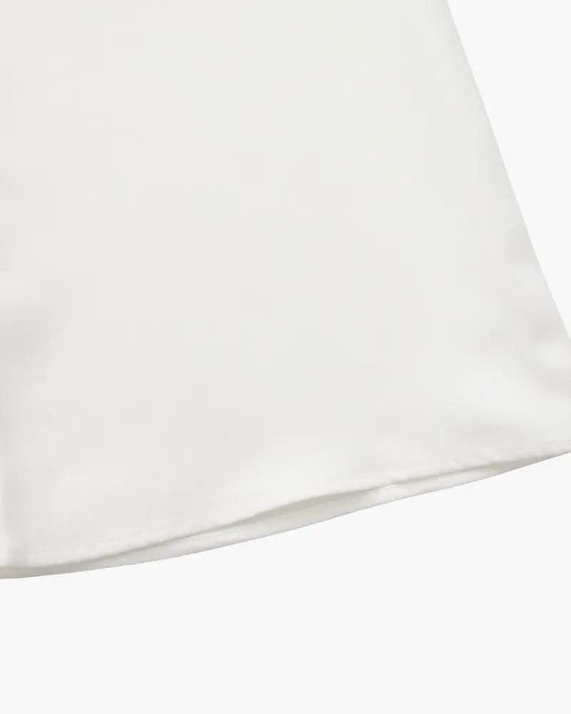 Pantalon Palais Danoir Paris en ivoire, coupe élégante, tissu fluide, vue de face sur un mannequin.