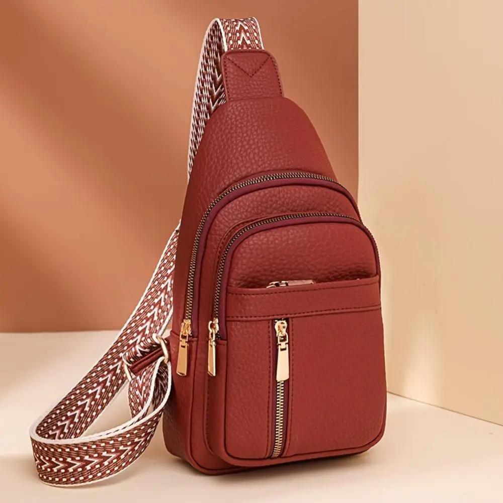 Sac à bandoulière Fiona de Danoir Paris en kaki avec roulettes, design pratique et élégant pour voyager ou transporter des objets.