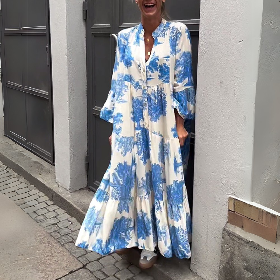Robe maxi élégante Nerina de Danoir Paris en tissu kaki, longueur fluide et style sophistiqué visible sur l’image.