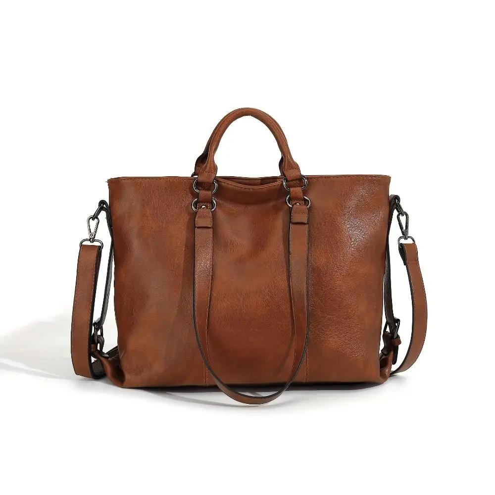 Sac shopper vintage Danoir Paris Bianca en cuir marron avec poignée élégante et détails raffinés, style intemporel et sophistiqué.