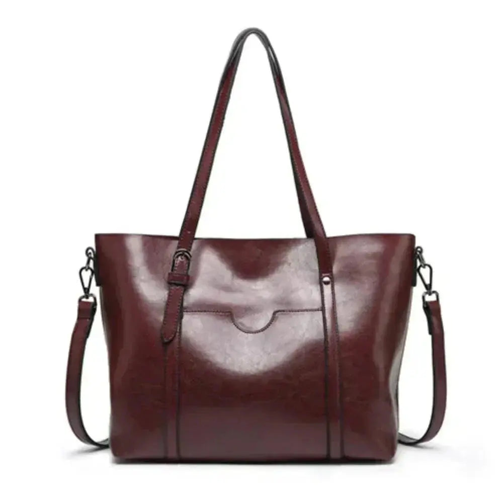 Sac à main Danoir Paris Blythe en cuir marron, sac de luxe élégant avec détails sophistiqués pour un style intemporel.