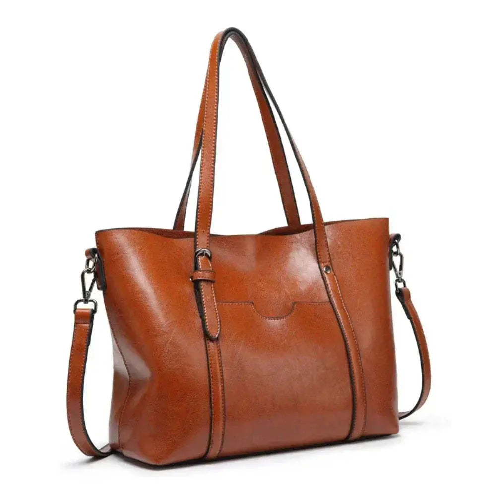 Sac à main Danoir Paris Blythe en cuir marron, sac de luxe élégant avec design intemporel et détails sophistiqués.
