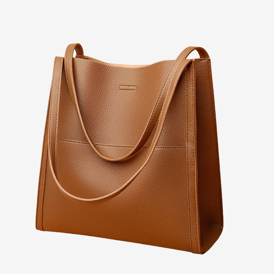 Sac à main en cuir marron Elise de Danoir Paris, accessoire élégant avec poignées et fermeture métallique visible.