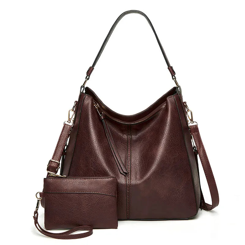 Sac à main en cuir vintage Danoir Paris Étoile de Ville, sac à main classique marron avec détails élégants.