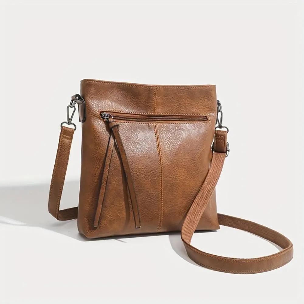 Sac à bandoulière vintage Danoir Paris Lina avec motif échiquier marron, design élégant et classique.