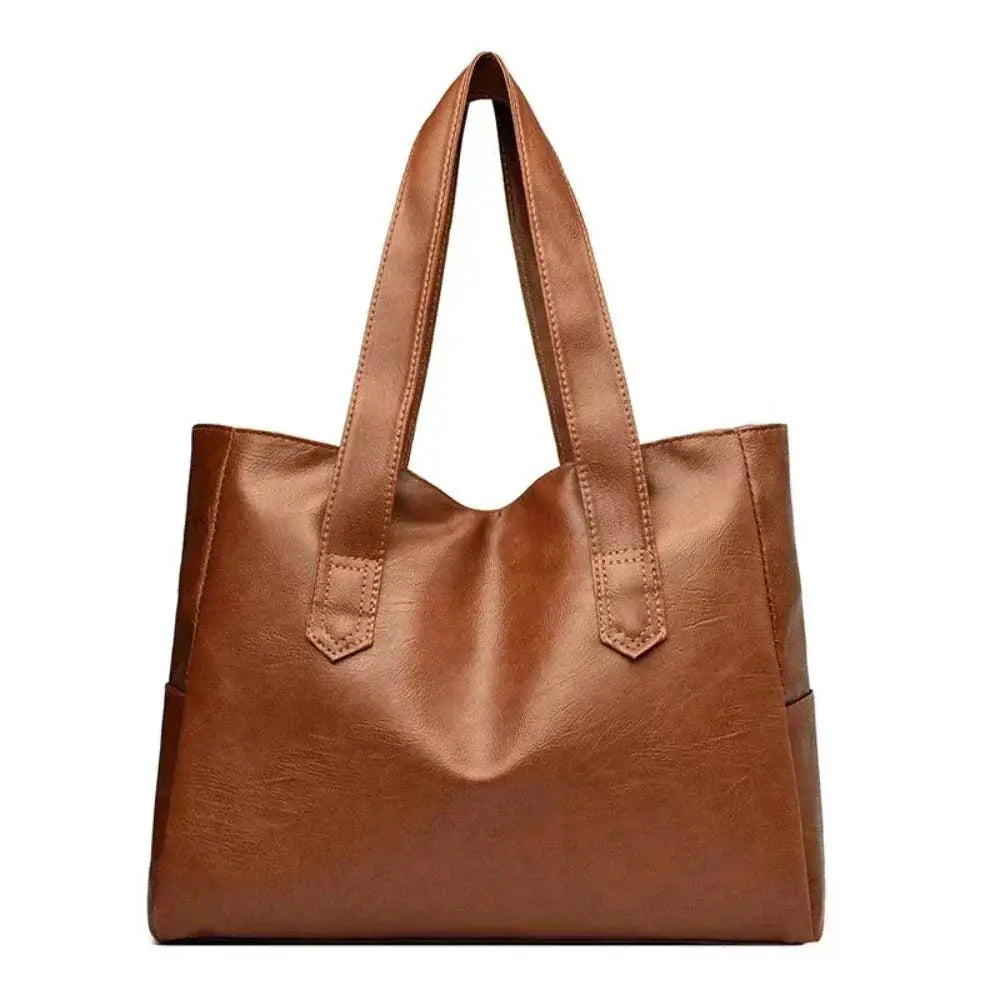 Sac à main minimaliste élégant Danoir Paris en marron, design épuré et sophistiqué, idéal pour un look chic et moderne.