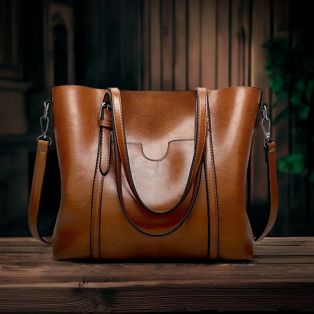 Sac à main Lydia élégant de Danoir Paris, en marron, avec poignées et détails sophistiqués visible dans l'image.