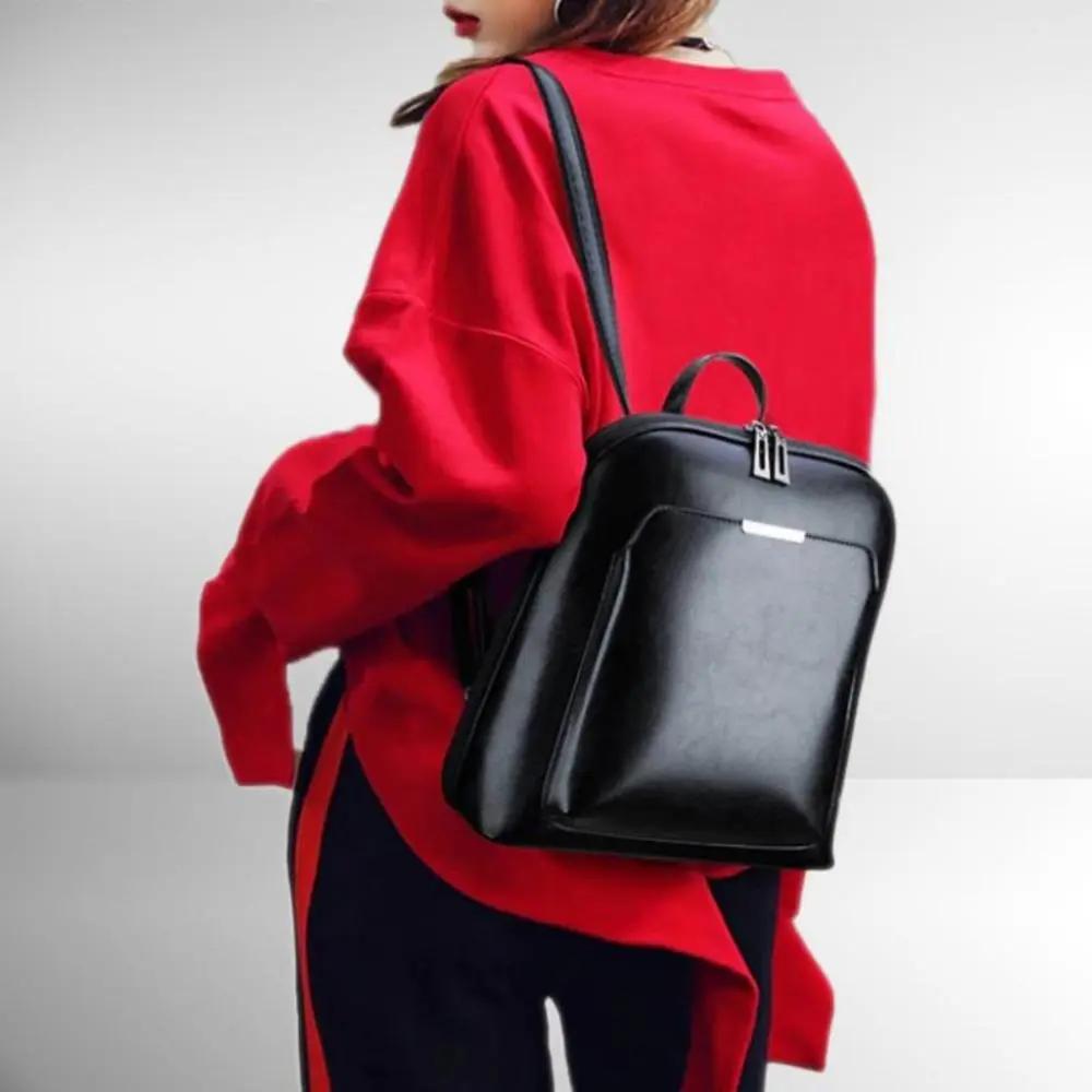 Sac à deux zips Naomi de Danoir Paris, sac à main marron élégant avec design intemporel et simplicité raffinée.