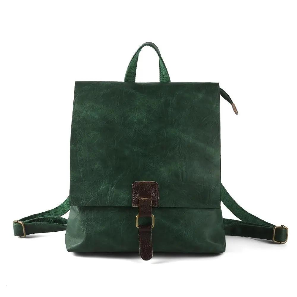 Sac à dos Danoir Paris Nina en cuir marron avec style vintage, sac polyvalent et élégant pour un look rétro.