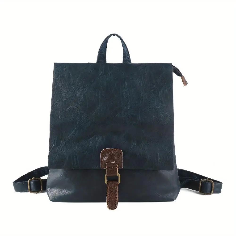 Sac à dos Danoir Paris Nina en cuir marron, style vintage, avec poches et détails classiques, vue de face.