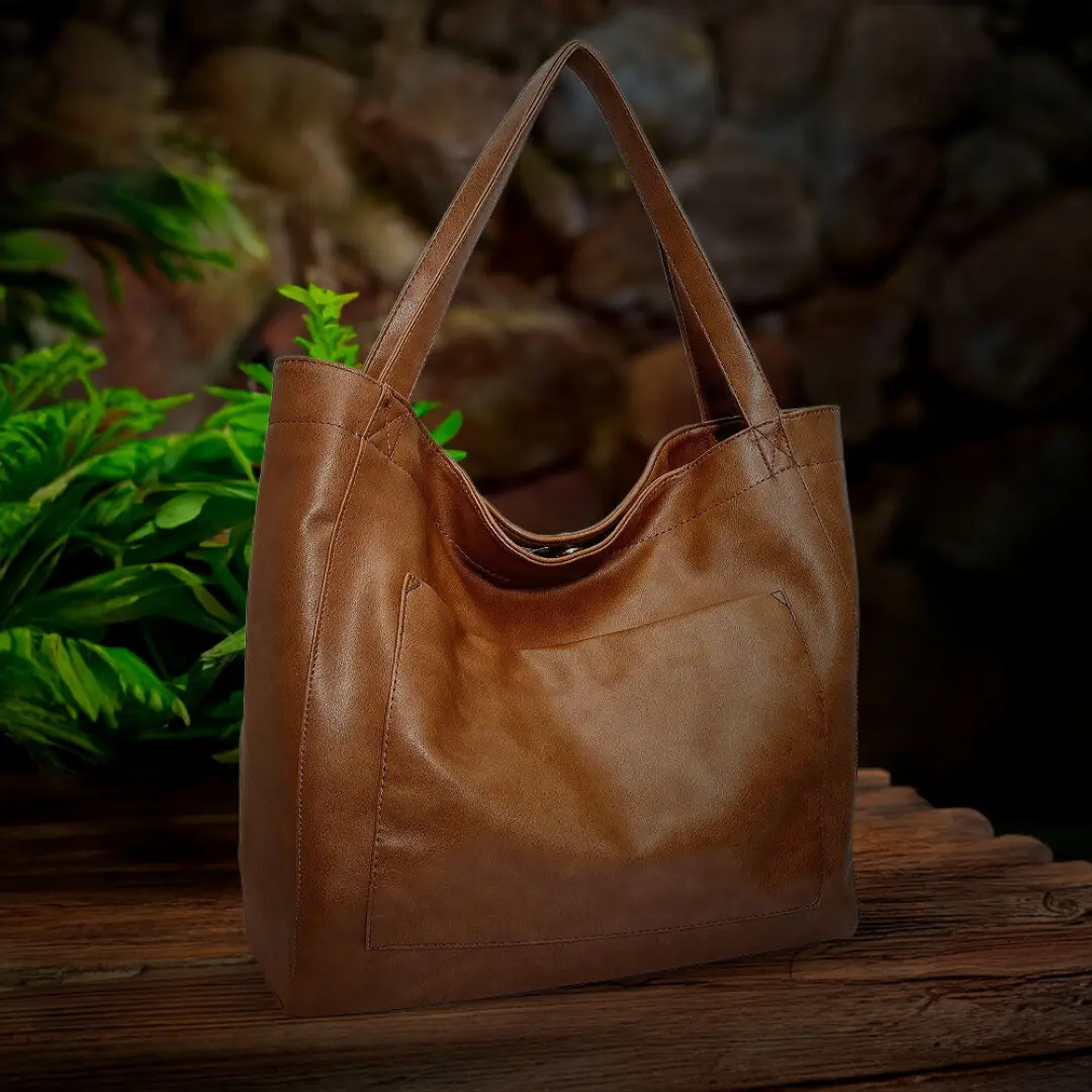 Sac à bandoulière rétro-chic Danoir Paris Seraphina en cuir marron, avec détails élégants et design tendance.