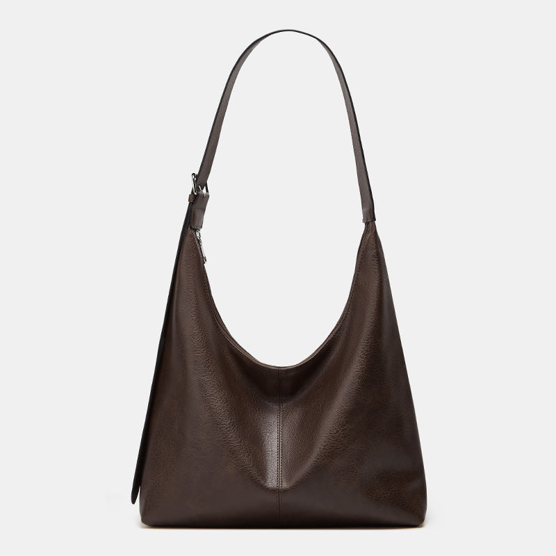 Sac à dos Danoir Paris Victoria en marron, grand sac à dos polyvalent avec grande capacité, idéal pour un usage quotidien.
