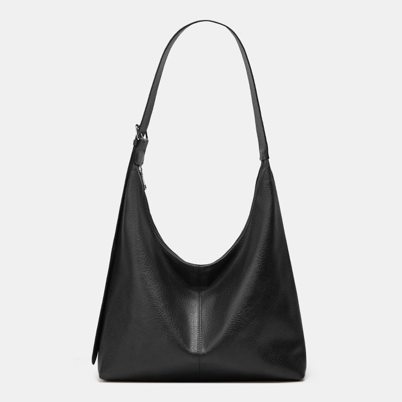 Sac à dos Danoir Paris Victoria en marron, grand volume et polyvalent, avec plusieurs compartiments pour un usage quotidien.