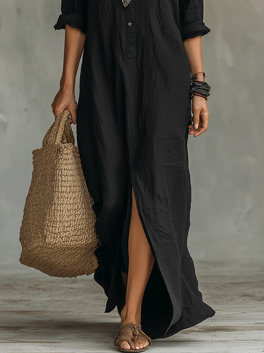Robe longue noire Danoir Paris Soline avec boutons, style maxi dress, en tissu fluide et élégant.