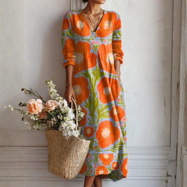 Robe florale enchantée Claire™ de Danoir Paris avec motifs colorés et coupe élégante, vue de face.