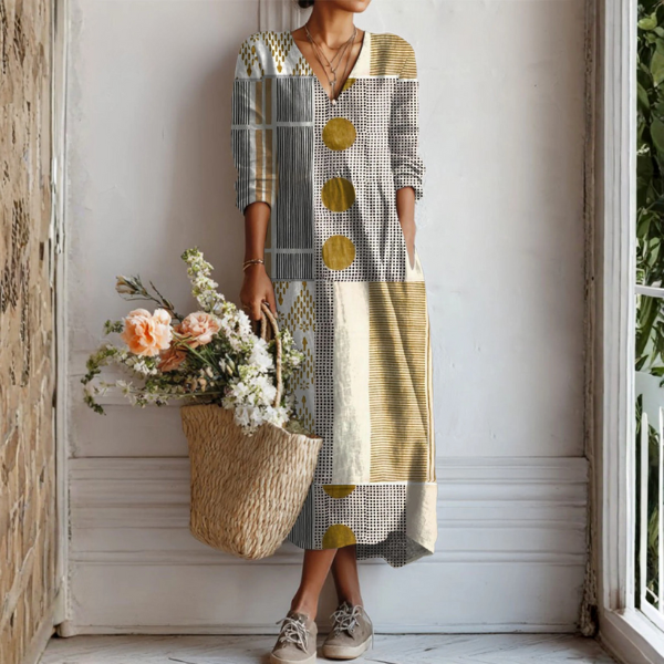 Robe bohémienne Emily™ multicolore de Danoir Paris avec motifs floraux et coupe fluide, idéale pour un style décontracté et élégant.