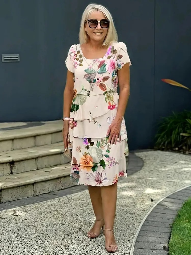 Robe florale chic Mallory de Danoir Paris avec motif multicolore, manches longues et coupe élégante, vue de face.