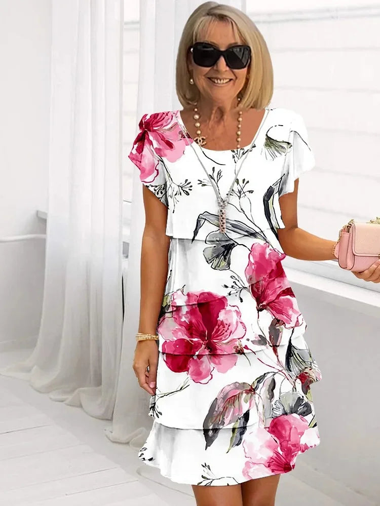 Robe florale chic Mallory de Danoir Paris, motif multicolore, coupe élégante, portée légère et féminine.
