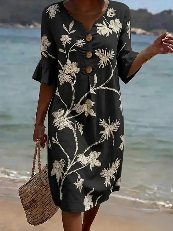 Robe décontractée pour femme Danoir Paris avec imprimé floral noir, style confortable et élégant.