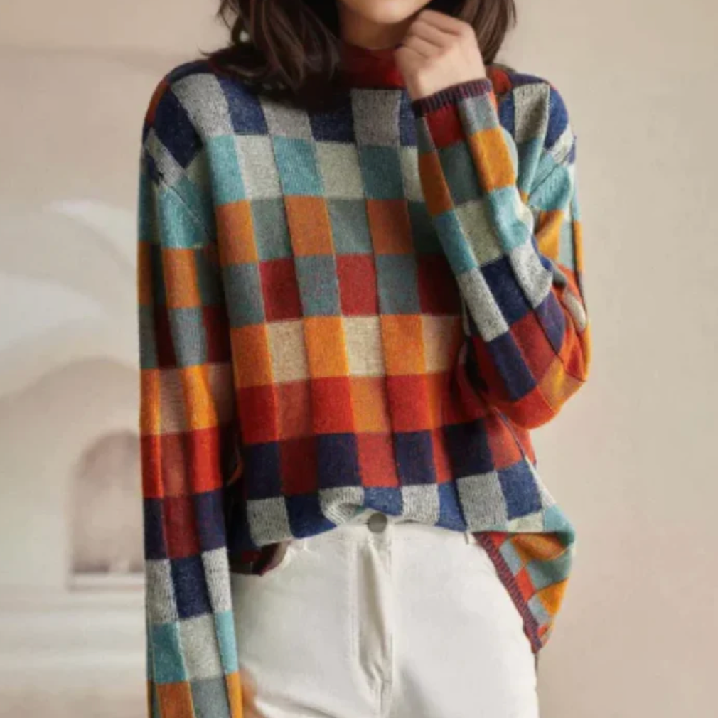 Pull rétro confortable Isla de Danoir Paris, nouvelle collection, tissu doux, coupe décontractée, couleur neutre, style tendance.