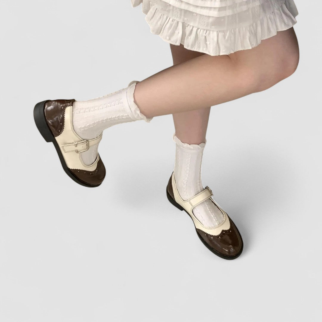 Pyjama pour bébé Gabrielle™ contrasté de Danoir Paris, en coton noir et blanc, avec motifs mignons et confortables.