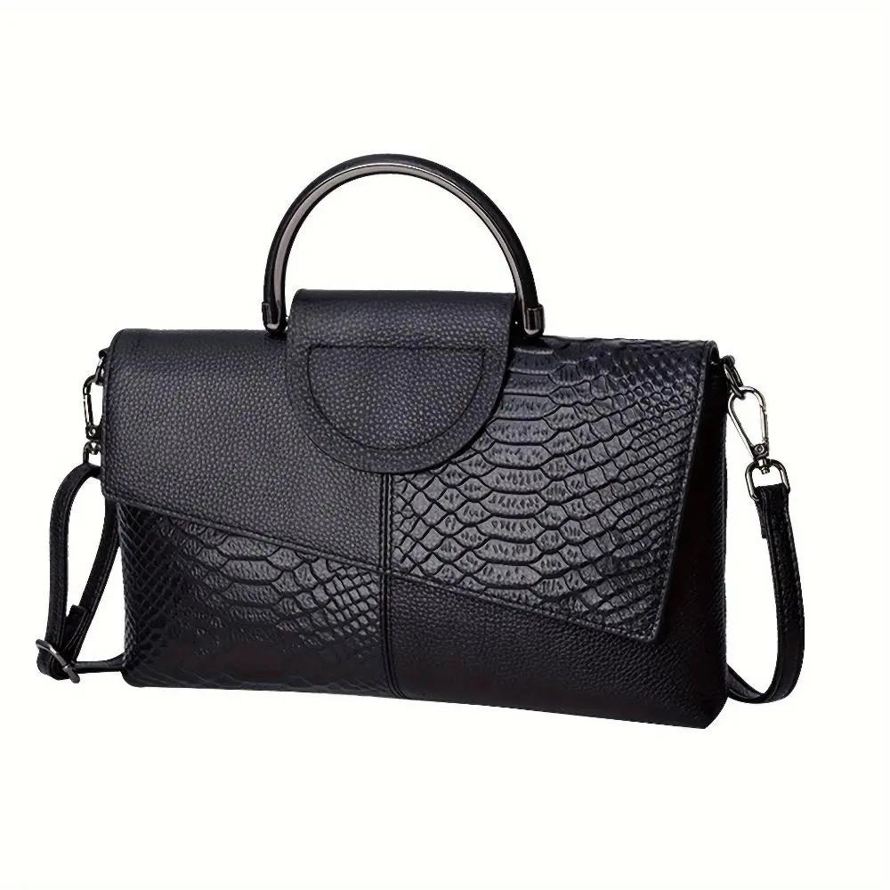 Sac à main Cassandra Danoir Paris avec motif crocodile opulent, sac élégant en cuir noir et détails sophistiqués.