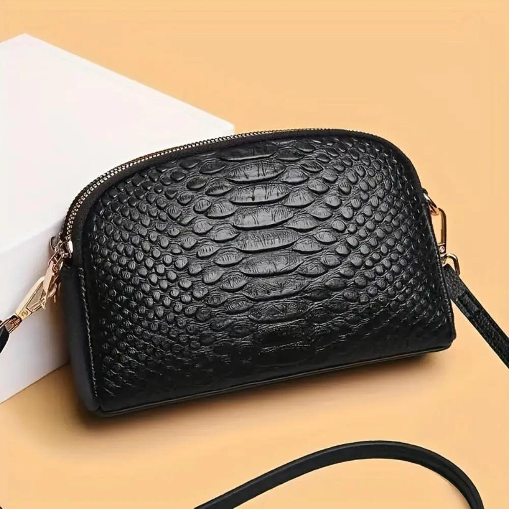 Mini sac à bandoulière Danoir Paris Cora en simili cuir avec motif crocodile, noir, élégant et compact.