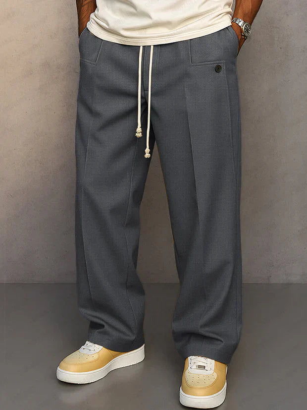Pantalon élégant noir Danoir Paris Duval avec cordon ajustable, coupe moderne et détails sophistiqués, pour un look chic.