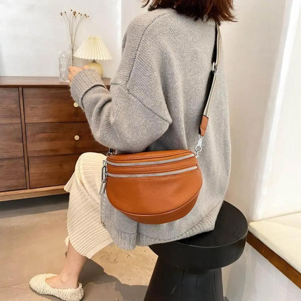 Sac à bandoulière noir Danoir Paris Mira, sac chic et polyvalent en cuir élégant avec bandoulière ajustable.