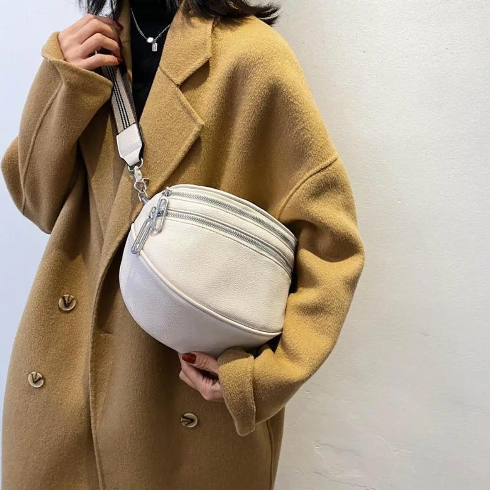 Sac à bandoulière noir Danoir Paris Mira, sac chic et polyvalent avec finition élégante et poignée ajustable.