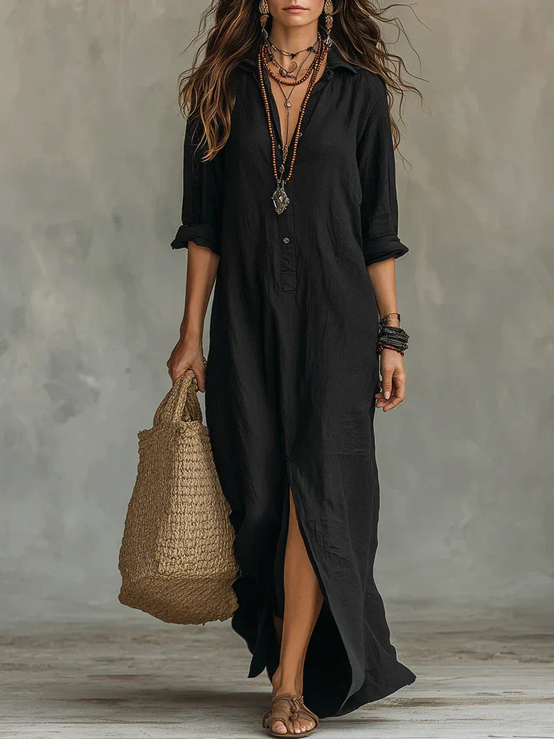 Robe maxi noire ample avec boutons de la marque Céline™ par Danoir Paris, vue de face sur mannequin.
