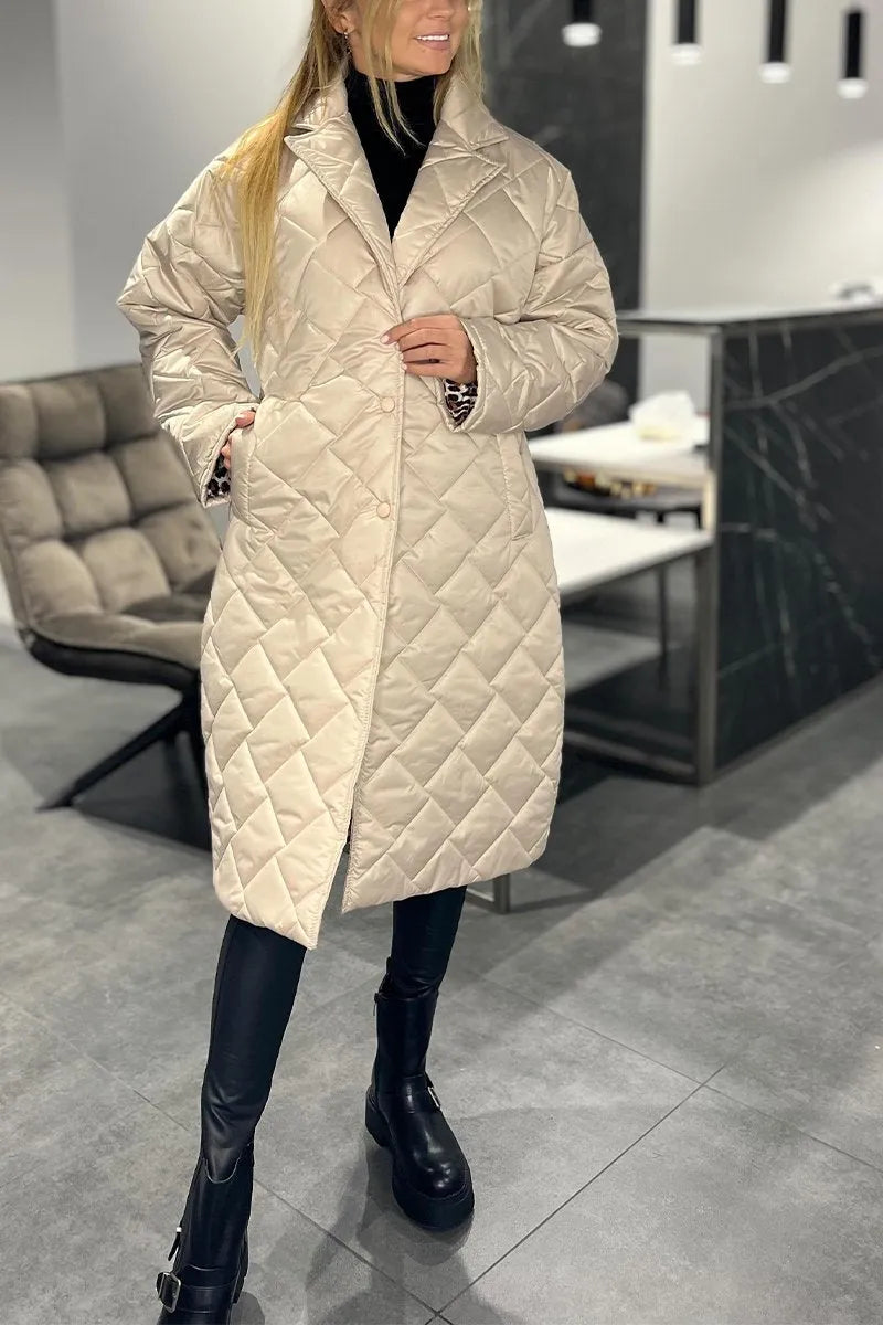 Manteau léopard noir Danoir Paris, élégance, tissu chaud, coupe moderne, motif animalier, style chic et tendance.