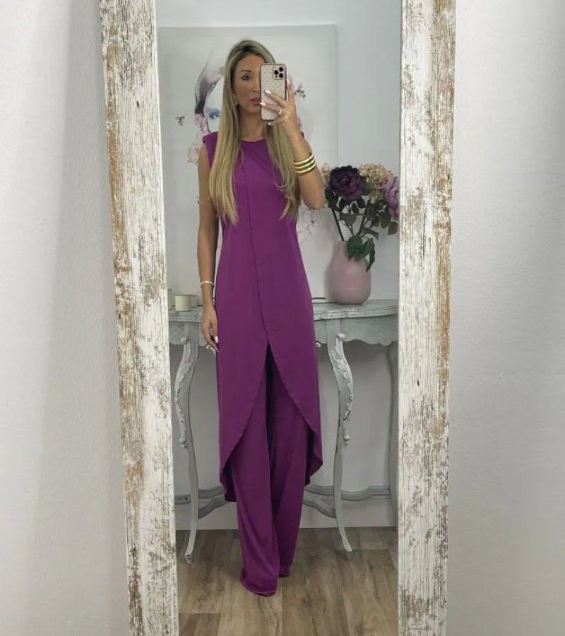 Ensemble chic sans manches Flavia par Danoir Paris, vêtement élégant noir avec détails sophistiqués, porté sur mannequin.