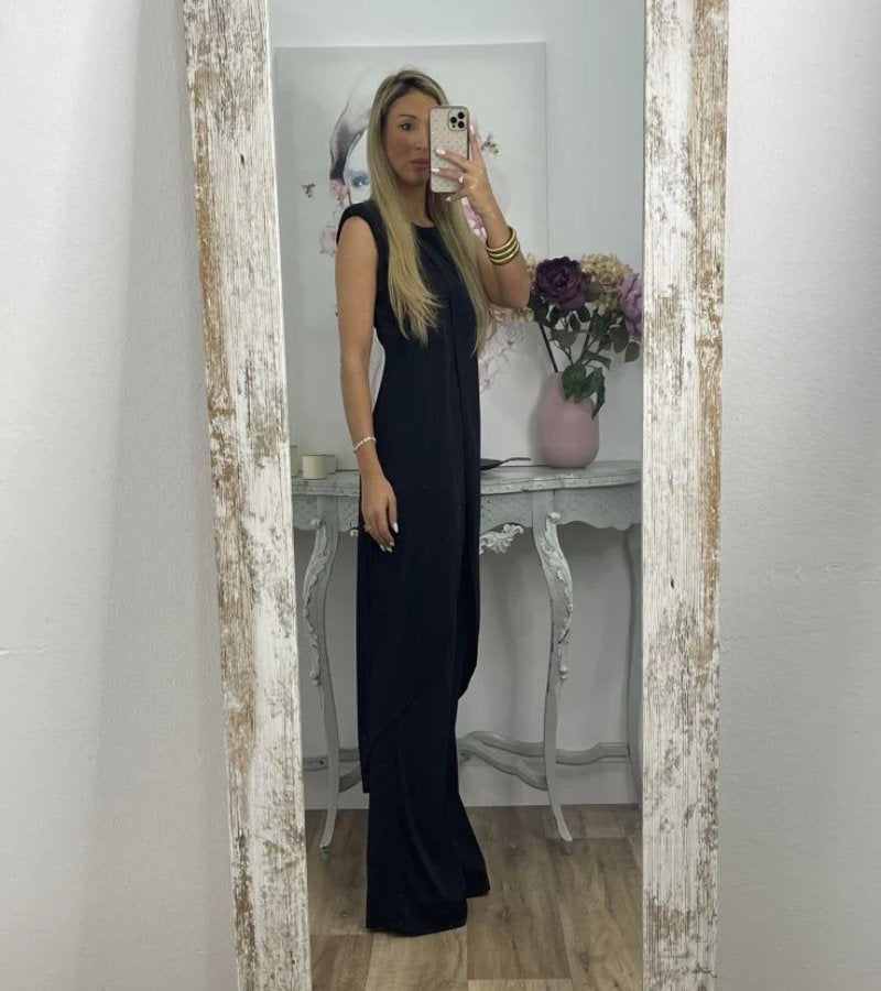 Ensemble chic sans manches Flavia de Danoir Paris, élégant, en tissu noir, porté sur un mannequin.