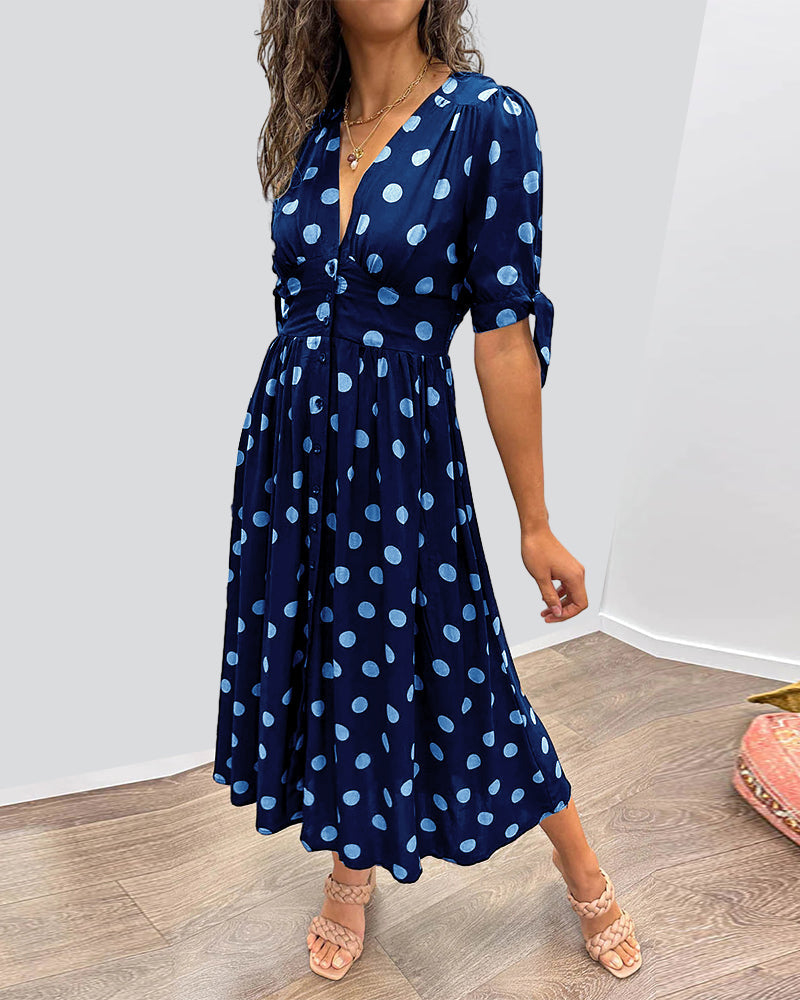 Robe noire à pois Miley de Danoir Paris, V-cou, coupe élégante, portée décontractée ou habillée.